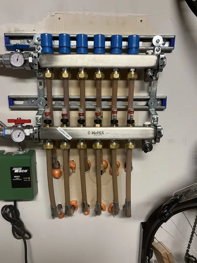 Plumber performing Gas Line Installation at a residential property in Freeland